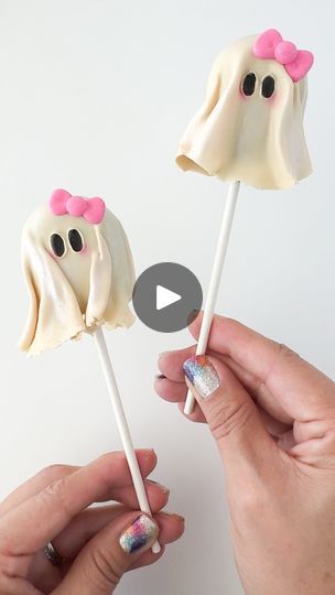 5.6K views · 604 reactions | Let’s make some super cute ghost cakepops! 🩷👻 Ditch the fondant and go for modeling chocolate—a tastier choice for these sweet little ghosts!  Products used: 🩷 Modeling chocolate: @hothandsmc 🩷 Bow icing sprinkles: @simplysucre 🩷 Pink paint powder & white metallic lustre: @sweetsticksau 🩷 Popsicle cakepop mold: @mylittlecakepopmolds (Affiliate discount code: UNFORGEDIBLEART10)  #cakepops #spookyseason #ghosts #cuteghost #cakepopper #cakepopping #halloweentreats #cakepop #cute #spookycute #baking #cakedecorating | Ana | Unforgedible Art® | Hotel Pools · Hours Ghost Cakepops, Ghost Cake Pops, Halloween Cakepops, Icing Sprinkles, Ghost Cake, Halloween Cake Pops, Art Hotel, Halloween Cookie, Modeling Chocolate