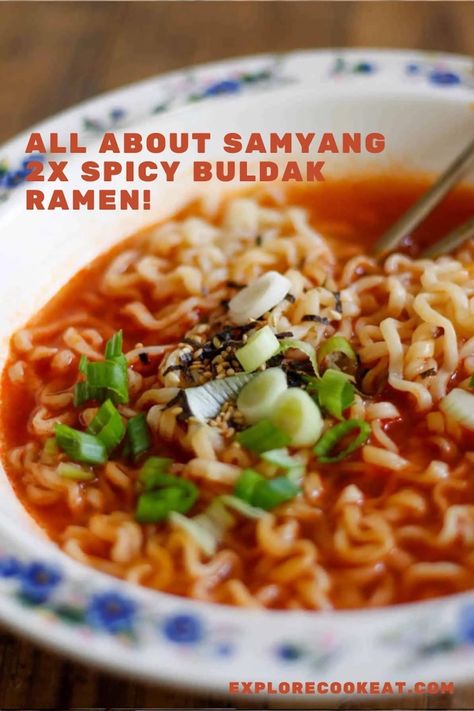 A blue patterned bowl with 2x spicy buldak ramen noodles in a spicy broth garnished with green onions and seaweed flakes.  There is a pair of silver chopsticks in the bowl. Spiciest Noodles, Spicy Buldak Ramen, Buldak Ramen Recipe, Buldak Ramen, Ramen Recipe, Spicy Noodles, Ramen Recipes, Party Food, Ramen