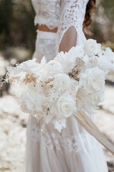 Outdoor Festival Bohemian Wedding Inspiration | This boho bride carries a beautiful white monochromatic wedding bouquet which features ranunculus, roses, fern, silver dollar eucalyptus, ruscus, ming fern, leatherleaf fern, mini gypsophila and neutral rice flower accents tied with champagne ribbon. | Photography: Shae Estella Photo Bohemian Wedding Inspiration, Wedding Crashers, Festival Wedding, Bride Bouquets, Bridal Flowers, Beautiful Bouquet, Rose Wedding, Bohemian Wedding, Wedding Florist