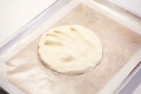 Press your child's hand into the dough. Hand Print Mold, How To Make Plaster, Clay Handprint, Plaster Hands, Homemade Clay, Baby Handprint, How To Make Clay, Handprint Crafts, Mold Kit