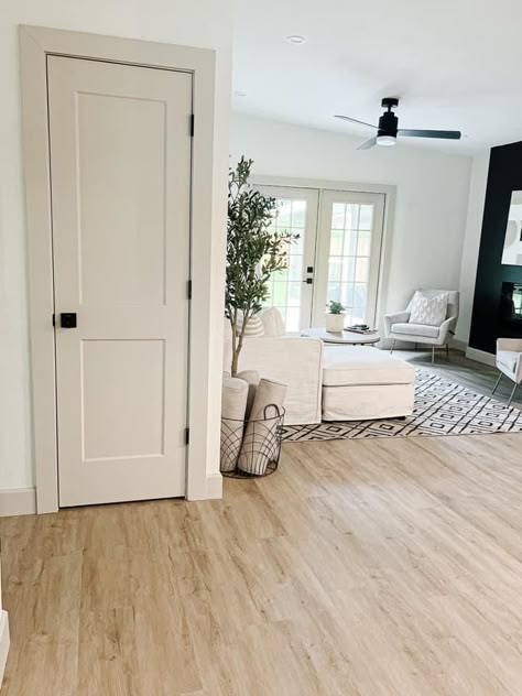 Ivory Trim White Walls, House Trim Colors Interior, Beige Hallway Doors, Cream Walls With Beige Trim, Floor And Door Trim Ideas, White Trim Off White Walls, Off White Baseboards And Trim, White Baseboards And Wood Trim Doors, White And Cream Walls