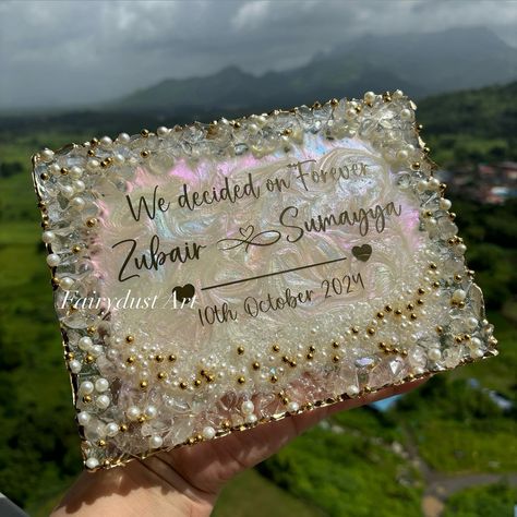 “Turn a special day into a memory that lasts forever.” ✨ and Celebrate love with a timeless gift . This wedding season, give a gift to your loved ones which is as one-of-a-kind as their love—handcrafted resin art couple frames with a personal touch. We create keepsakes that last a lifetime. . A perfect gift for any occasion, whether it’s a wedding or anniversary. Order now and make their moments timeless! #weddinggifts #CoupleFrame #AnniversaryGift #PersonalizedGifts #ResinArt #tabledecor... Wedding Plaques, Art Couple, Give A Gift, Timeless Gifts, Celebrate Love, Wedding Collection, Couple Art, Wedding Season, Resin Crafts