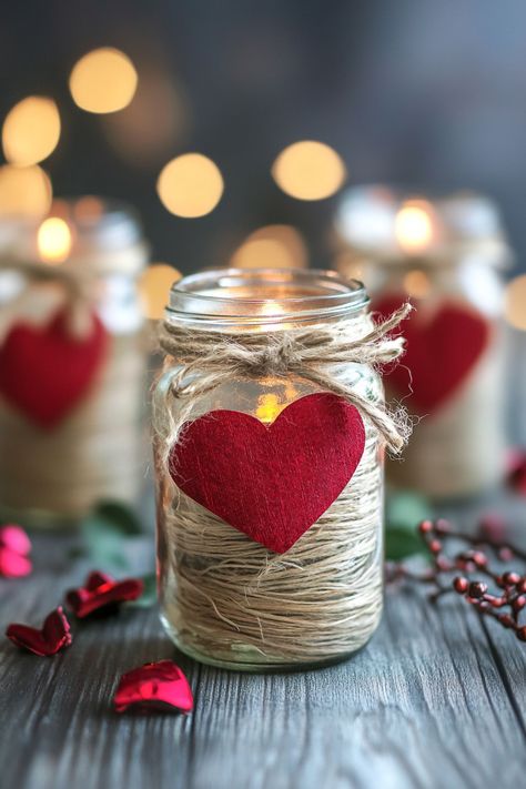 Get ready to spread the love with these 30 Stunning Valentine’s Day Mason Jar Ideas You’ll Love! Perfect for gifts, decorations, or fun crafts, these ideas transform simple jars into romantic treasures. Create candlelit mason jar lanterns, layered candy jars, or DIY love notes in a jar to show someone you care. Add a festive touch with painted hearts, sparkling glitter accents, and rustic twine bows. Use them as centerpieces, treat holders, or flower vases to elevate your Valentine’s Day celebra Valentine Mason Jar Crafts, Valentine Lantern Ideas, Mason Jar Valentines Ideas Diy Gifts, Tiny Jar Crafts, Love Notes In A Jar, Diy Love Notes, Notes In A Jar, Valentines Day Crafts To Sell, Heart In A Jar