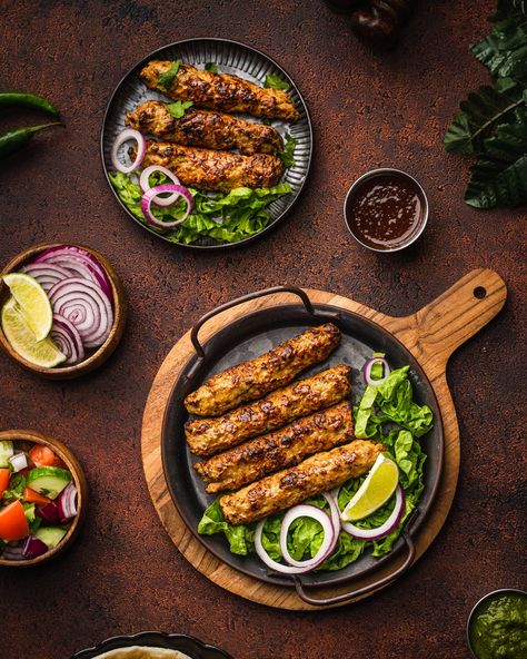 Experience the best kebab time of your life! Hand made and prepared on a charcoal flame grill, every piece is individually skewered and cooked to bring out its authentic flavour!! The best part, our Chicken Seekh Kebabs are fully cooked and pack a kick that’s sure to leave you coming back for more! #alsafafoods #halal #halalfood #iftar #iftarideas #ramadan #ramadan2023 #kebab #kabob #kebob #seekhkebab #seekhkebob #chickenkebab Chicken Kabab Food Photography, Kebab Photography Food Styling, Grilled Food Photography, Kebab Platter Photography, Kababjees Restaurant Snaps, Kebabs Photography, Seekh Kebab Photography, Kebab Food Photography, Iranian Kebab