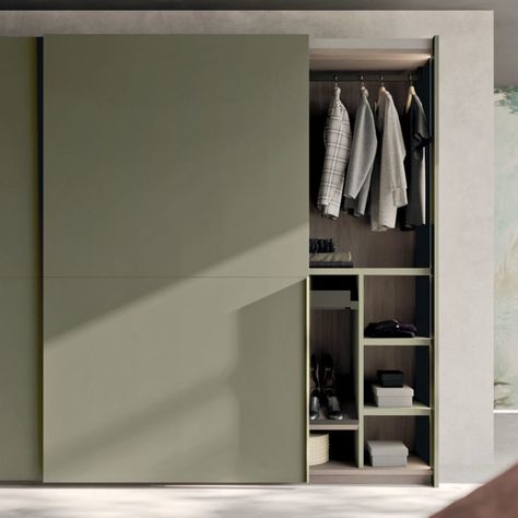 The Riga sliding door, characterised by its prominent aluminium profile handle, imparts a distinctive aesthetic to the wardrobe, dividing it into two sleek panels. Beyond its visual appeal, the handle serves a functional role, streamlining access to the storage space within the wardrobe. The entire sliding door collection is equipped with magnetic soft-closing and opening systems, ensuring a smooth and controlled user experience. Furthermore, the doors feature height and alignment adjustment mec Wall Wardrobe Sliding Doors, Sliding Wardrobe Handles, Sliding Wardrobes For Bedrooms, Aluminium Wardrobe Design, Slide Door Wardrobe, Sliding Wardrobe Design Bedroom, 2 Sliding Door Wardrobe Design, Wardrobe Sliding Door Design, Sliding Wardrobe Doors Design