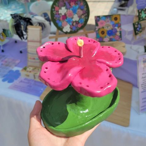 Pink Hibiscus Jewelry Holder🌺 This beautiful hand sculpted, painted & glazed piece can hold 12 pairs of earrings and has a jewelry dish at the bottom for any rings, bracelets, or trinkets. Only one is available! So let me know if you would like me to reserve it for you. #hibiscus #jewelryholder #earringholder #jewelrydish #clayart #handmade #handpainted #glazedclay #flowerart #hibiscusart Hibiscus Jewelry, Pink Hibiscus, Earring Holder, Rings Bracelets, Jewelry Dish, Jewelry Holder, Clay Art, Beautiful Hand, Hibiscus