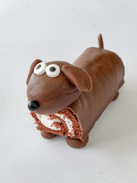 Swiss Roll Dog Cake, Swiss Roll Birthday Cake Ideas, Sausage Dog Party Theme, Wiener Dog Party, Cute Animal Birthday Cake, Sausage Dog Birthday Cake, Sausage Dog Cake Dachshund, Dachshund Party Ideas, Dog Themed Snacks