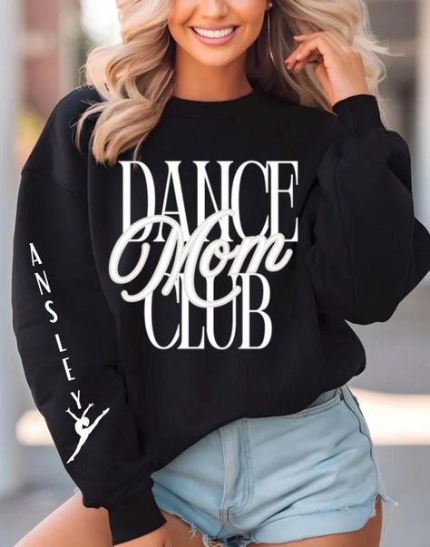 Custom Dance Mom Club - Personalized Dance Mom T-shirt with Daughter's Name Show your support and sparkle in style with this Custom Dance Mom Shirt, designed especially for the proud moms of dancers! Whether you're at the competition, recital, or cheering from the sidelines, this trendy shirt combines comfort, personalization, and a dash of dance mom pride. ✨ Why You'll Love This Shirt: Personalized Just for You: Add your daughter's name on the sleeve for a unique and meaningful touch! Perfect for showing your support for your little dancer. Comfortable & Soft: Made with high-quality, soft cotton (or cotton blend), this shirt ensures you stay comfortable while you cheer on your dancer. Great Gift for Dance Moms: Looking for the perfect gift for a dance mom? This custom tee is a thoughtful Dance Mom Shirts Design, Dance Mom Shirt, Dance Mom Shirts, Dance Comp, Mom Pride, From The Sidelines, Custom Tee, Dance Mom, Moms Club