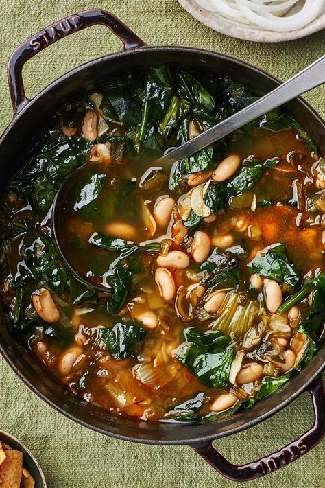 This bright and hearty spring chili with greens from Test Kitchen director Chris Morocco is sure to shake the winter blues. No tomatoes, just lots of chiles, beans, and aggressive use of your spice cabinet, and you can create a chili that’s perfect for the in-between season, when it’s still cold, but you refuse to wear a winter coat anymore. This dish can be made with water, but chicken broth adds extra oomph. Bean Protocol Recipes, Bean Protocol, Quick Chili, Cubanelle Pepper, Bon Appetit Recipes, Chicken Base, Spice Cabinet, Soups Stews Chilis, Greens Recipe