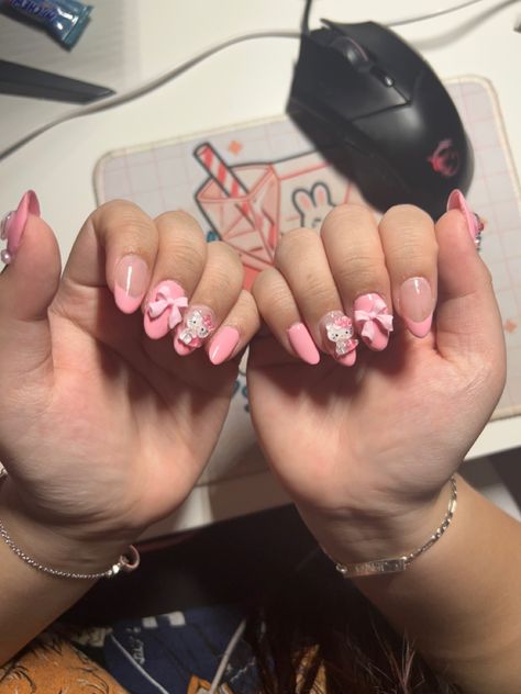 almond nails, with charms. medium shape pink My Melody Nails Almond, Hello Kitty Nails Almond Shape, Short Almond Nails With Charms, Nails With Charms Medium, Almond Hello Kitty Nails, Almond Nails With Charms, Hello Kitty Almond Nails, Hello Kitty Charm Nails, Pink Nails With Charms