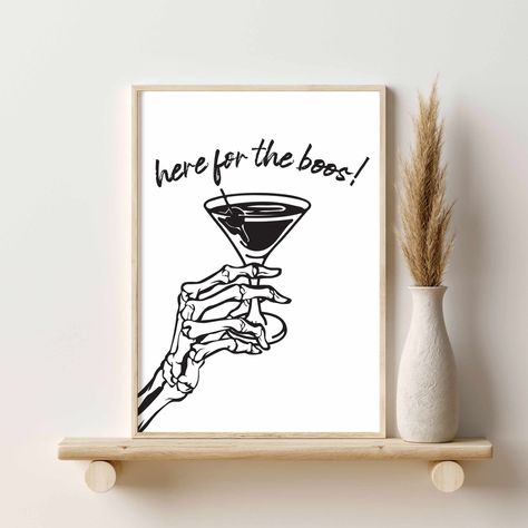 "DIGITAL DOWNLOAD.  Here for the Boos Halloween Decor, Skeleton Hand Cocktail Print, Halloween Bar Art, Halloween Party Decor, Halloween Wall Art *To view this item as a printed and shipped poster, please see this listing: https://www.etsy.com/listing/1539449615/ *To view this item as a gallery wall set, please see this listing: https://www.etsy.com/listing/1525518948/ Instant downloadable artwork is an easy project and great last minute gift.  You can spend a little, make as many prints as you Halloween Decor For Bar Area, Fall Bar Decor, Spooky Snoopy, Halloween Bar Decor, Halloween Mural, Skeleton Artwork, Gold Halloween, Elegant Halloween Decor, Halloween Party Decor Diy