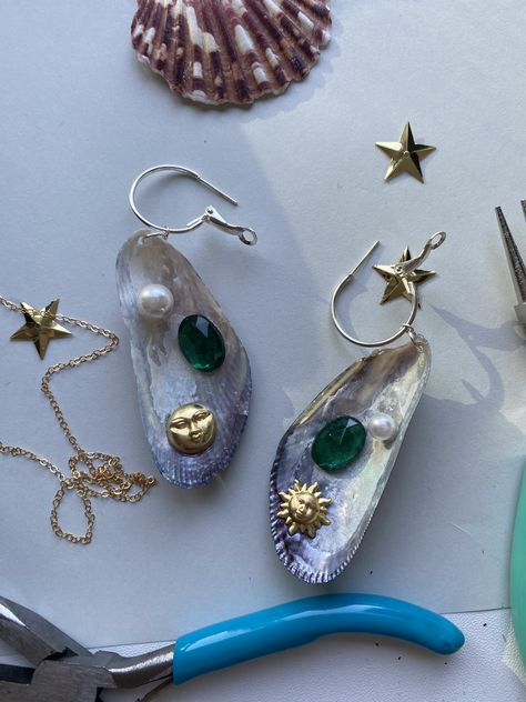 natually-sourced purple mussel shells with brass sun and mooon faces, faux emeral and pearl on sterling silver hoops Mussel Shell Jewelry, Mussel Shell Crafts, Mussel Shell, Clay Work, Sea Witch, Homemade Jewelry, Shell Jewelry, Shell Crafts, Shell Earrings