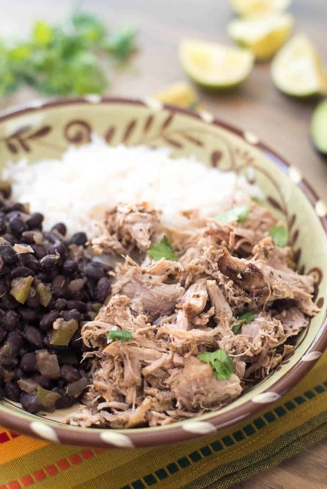 Easy Slow Cooker Cuban Pork with Black Beans and Rice is a satisfying, flavorful meal you can make any night of the week. The pork roast cooks low and slow throughout the day and the black beans and rice can be made just before you are ready to serve. #cubanpork #pork #slowcooker #crockpot #cubanrecipes Rice And Beans Slow Cooker, Cuban Black Beans And Rice, Cuban Rice And Beans, Beans Slow Cooker, Cuban Rice, Slow Cooker Cuban Pork, Red Beans Recipe, Pork Slow Cooker, Cuban Pork