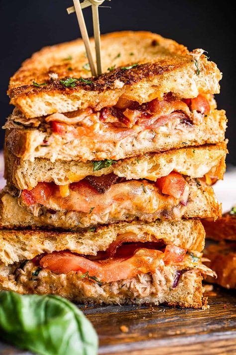 My Tuna Grilled Cheese Sandwich recipe boasts mouthwatering, flaky tuna with shredded cheddar, crisp bacon and fresh tomatoes, all grilled to perfection on buttery bread! You’re gonna love this tasty tuna melt! #tunamelt #tunasandwich Grilled Tuna Sandwich, Tuna Grilled, Tuna Sandwich Recipes, Easy Weeknight Recipes, Tuna Melt Sandwich, Perfect Grilled Cheese, Grilled Tuna, Grill Cheese Sandwich Recipes, Cheese Sandwich Recipes