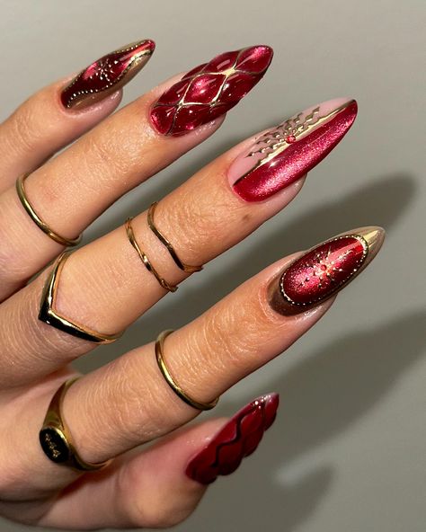 gold snowflakes and red velvet Handpainted using @stellar_gel HF hard structure gel pink cashmere Cathedral ruby mixed with silver bells cat-eye @amazon chrome @sissiofficial_ Easy-squeezy Ring finger and thumb inspired by @heygreatnails ✨ #nails #nailsofinstagram #nailsonfleek #nails💅 #nails2inspire #nailswag #nailstyle #nailsnailsnails #showyourclawssss #nailart #naildesigns #nailsoftheday #naildesign #nailthegram #nailinspo #thenailconnectionxo #nailsmagazine #nailitmag #scratch... Ruby Red Nails Designs, Gold Snowflake, Silver Bells, Nails Magazine, Eyes Lips, Nails On Fleek, Ring Finger, Swag Nails, Nail Inspo