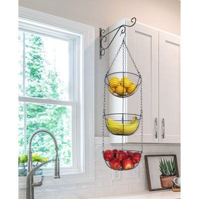 Made of quality material iron, 3 tier fruit basket has strong construction for fruit or vegetables of any weight. Having a heavier gauge than competing models and adjustable tier clips lets you place any sized fruit on whichever tier you wish. It is also easy to assemble and hang with extra heavy and durable top hook. Size: 39" H x 11.4" W x 11.4" D | Prep & Savour Metal Basket Metal in Black, Size 39.0 H x 11.4 W x 11.4 D in | Wayfair | Organization Hanging Fruit Basket, Black Wire Basket, Produce Baskets, Tiered Fruit Basket, Hanging Fruit Baskets, Fruit And Vegetable Storage, Vegetable Storage, Fruit Storage, Metal Baskets