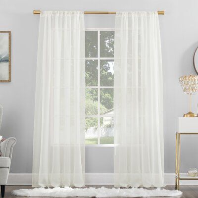 This single curtain panel is sheer, adding a decorative accent to your space while allowing light to flow through freely. It's made from polyester in a neutral hue, and it has 3" rod pockets that let it slide easily onto your curtain rod (sold separately). This curtain panel is machine-washable in a cold gentle cycle, and it's tumble-dry-safe with low heat. Whether you use it on its own or as a layering piece under a room-darkening curtain, it's sure to elevate your bedroom or living room decor. Healthy Room, Outside Light, Cool Curtains, Sheer Curtain Panels, Ashley Furniture Homestore, Rod Pocket Curtain Panels, Rod Pocket Curtains, Colorful Curtains, White Paneling