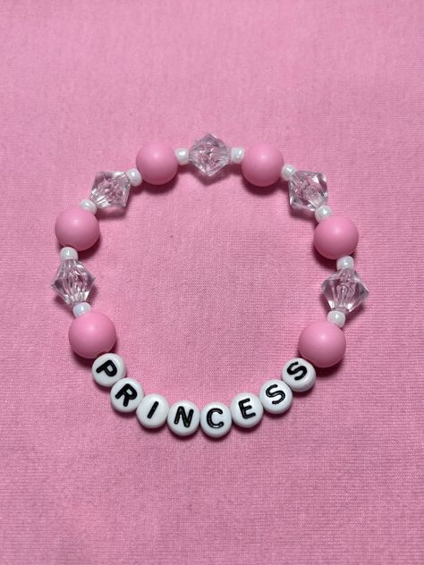 Princess Bracelet. For the princess that needs everyone to know they're royalty. Size is 7 inches. Princess Bracelet Aesthetic, Swear Word Bracelet, Friendship Bracelets 3 People, Pink Bracelets Ideas, Pink Kandi Bracelet, Ideas For Bracelets With Beads, Cute Bead Bracelet Ideas, Funny Bracelets Beads Words, Bracelet Ideas Beads