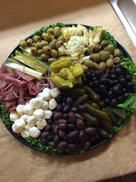 Antipasto Relish tray. Perfect for holiday parties. Olives And Pickles Tray, Pickle Olive Relish Tray, Olive Pickle Platter, Relishes/crudites Appetizers, Relish Tray Ideas Summer, Olive And Pickle Tray, Pickle Tray Ideas Parties, Pickle Olive Tray, Pickle Platter Ideas