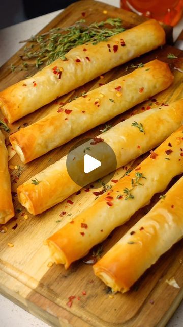 Steven Dunn on Instagram: "Prosciutto & Goat Cheese Phyllo Rolls  Ingredients   - Phyllo pastry  - Prosciutto  - Goat cheese  - 1 pear  - Olive oil - Butter  - Chili flakes  - Thyme  - Honey   Instructions   Cook these at 400 for 15 - 18 minutes.   #appitizers #snacktime #proscuitto #goatcheese #springroll #recipe #cheeseroll #charcuterie #foodblogger" Philo Recipes, Goat Cheese Phyllo, Phyllo Appetizers, Phyllo Rolls, Prosciutto Goat Cheese, Fancy Appetizer Recipes, Phyllo Recipes, Prosciutto Recipes, Phyllo Pastry