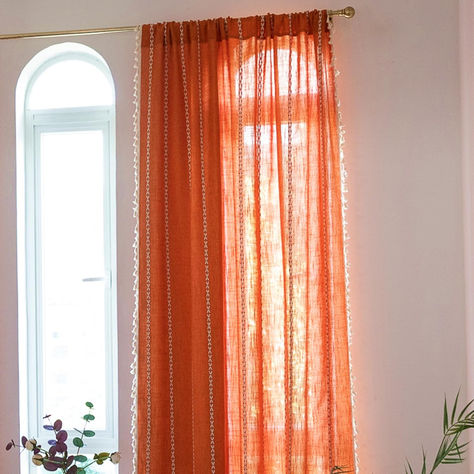 Enhance your space with boho chic curtain panel featuring elegant white stripes embroidered on weighted orange cotton linen. Adorned with handmade tassels on the edges, this 52"x84" panel adds charm and style. The top rod pocket design ensures easy hanging. It offers a semi-blackout feature, balancing light and privacy while allowing fresh air to flow. Bohemian Window Treatments, French Country Window Treatments, Country Window Treatments, Living Room Bohemian, Room Bohemian, Orange Curtains, Bohemian Farmhouse, Boho Chic Design, Vintage Bohemian Style