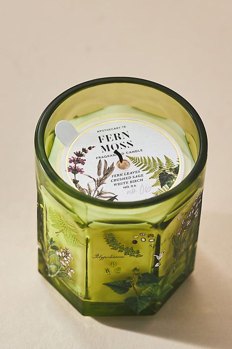 Adorned with beautiful botanicals, this only-at-Anthro fragrance lends everyday elegance to any living space — and is perfectly giftable for the scent-obsessed. Fern Moss (Fresh Herbal) : A botanical fusion of dense woodland foliage, leafy elm, and white birch lifted by sun-dappled citrus over fresh moss, dewy fern, and herbaceous lavender. For the best burn experience, keep the following in mind: The first time you light your candle, allow it to burn until the wax pool melts all the way to the Moss Wedding Centerpiece, Unique Candle Containers, Cool Candles, Moss Candle, Apothecary Design, Tropical Candles, Fern Moss, Themed Candles, Herbal Candles