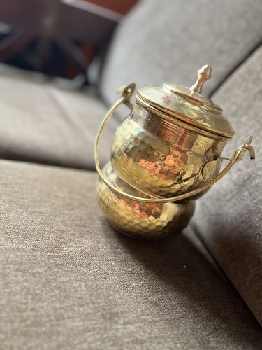 "This beautiful brass thooku is an absolute gem for ghee storage. The traditional design and exceptional craftsmanship make it a stunning piece of kitchenware. The thooku is compact, yet spacious enough to hold an ample amount of ghee, an..." - Basheera Brass Pot, Kitchen Food Storage, Kitchen Food, Ghee, Food Storage Containers, Traditional Design, Storage Containers, Food Storage, Kitchen Decor