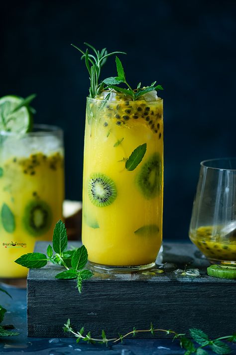 Pineapple Passion Fruit Mojito - Binjal's VEG Kitchen Tropical Fruit Juice, Fruit Shots, Fruit Mojito, Juice Ideas, Passion Fruit Mojito, Bartender Drinks Recipes, Lemon And Mint, Bartender Drinks, Candy Cocktails