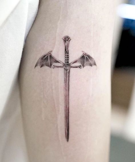 Dragon wing sword strength tattoo by @boomzodat Strength Symbol Tattoo, Tattoo About Strength, Strength Symbol, Courage Tattoos, Inspiring Tattoos, Female Strength, Small Dragon Tattoos, Our Mindful Life, Knight Tattoo