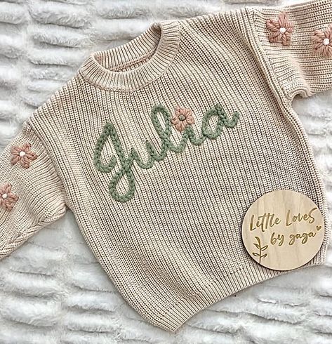 Happy Monday friends! Let me help you create a one of a kind baby gift for your bestie 🤍 Send me a DM and we can chat about some of my favorite sweater/yarn color combos and sizing. My turnaround time is currently 2-3 weeks. Sweater pricing guide is in the first pinned post. Have a great week 🤗 Embroidery Sweater Ideas, Embroider Sweaters, Embroidery Sweater Diy, Diy Embroidery Gifts, Embroidery Sweaters, Baby Name Sweater, Hand Embroidered Sweater, Tiktok Business, Hand Embroidery Letters