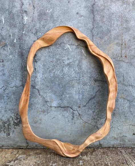 Crafted from solid Mahogany, this hand-carved organic mirror frame showcases flowing, asymmetrical curves inspired by biomorphic forms, blending organic modernism with minimalist elegance. The sculptural design emphasizes the wood’s natural grain, adding warmth and texture, while the seamless curves and balanced asymmetry create a statement piece for any modern space. Finished with a natural oil, this mirror embodies functional art and elevates any interior with its luxurious, artisanal craft... Organic Mirror, Organic Modernism, Natural Furniture, Mirror Frame, Natural Oil, Solid Mahogany, Functional Art, Modern Spaces, Modernism