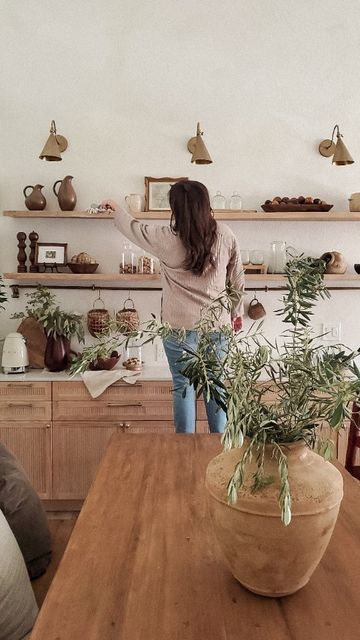 High Shelf Dining Room, How To Style Long Shelves, Long Floating Shelf Kitchen, Wood Shelves Dining Room, Dining Room Wall Shelving, Long Shelf Kitchen Wall, Long Shelf Dining Room, Natural Wood Floating Shelves Kitchen, Long Kitchen Shelves