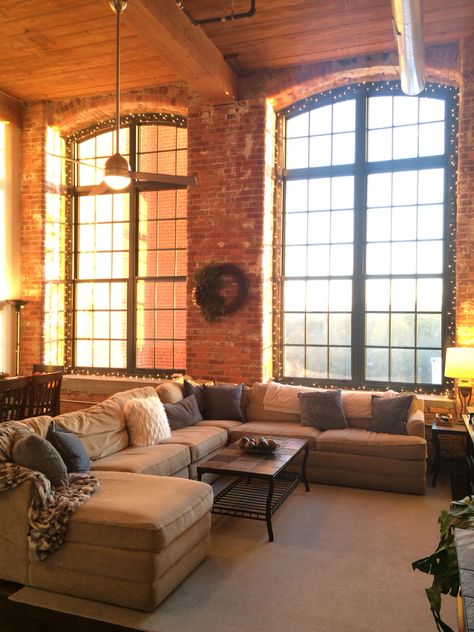 Loft apartment - exposed brick, high ceilings, arch windows, stained concrete floors Decor High Ceilings, Brick Loft Apartment, Ceilings Ideas, Mantel Christmas, Loft Apartment Decorating, Amazing Apartments, Apartment Loft, Trendy Apartment, Brick Loft