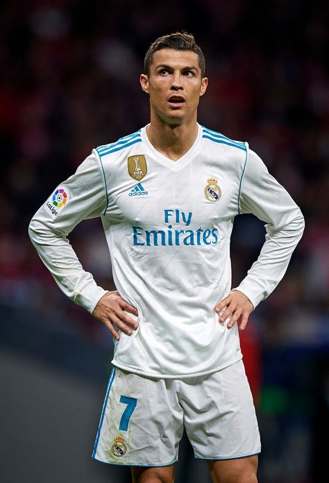 MADRID, SPAIN - NOVEMBER 18: Cristiano Ronaldo (R) of Real Madrid looks on during the La Liga match between Atletico Madrid and Real Madrid at Wanda Metropolitano Stadium on November 18, 2017 in Madrid, Spain. (Photo by fotopress/Getty Images) Real Madrid Kit, Cristiano Jr, Cr7 Wallpapers, Cristiano Ronaldo Junior, Ronaldo Juventus, Fly Emirates, Ronaldo Junior, Ronaldo Real Madrid, Ronaldo Real