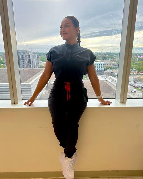 "Channeling my inner fig nurse in this sleek grey jumpsuit. #RockingIt #FigNurseStyle"#figs#NurseLife#scrubstyle#NurseFashion#ComfortandStyle##figsjumpsuit Jumpsuit Black Women, Nurse Outfits, Christian Flag, Nurse Aesthetic, Grey Jumpsuit, Nursing Fashion, Figs Scrubs, Medical Aesthetic, Dental Assistant