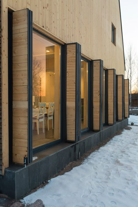 Chvoya uses steeply pitched roof to create a vantage point over a bay in western Russia Architecture Renovation, House By The Sea, Shutters Exterior, Sliding Glass Doors, Window Shutters, Design Exterior, Pitched Roof, Facade Design, Design Case