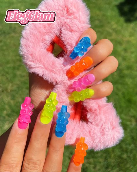 🌞✨ Summer Essential: Candy Bear Nails! 🐻🍭 Brighten up your summer with our Candy Bear nails! Each nail boasts a different, lively color and a cute 3D gummy bear. These multicolor magic nails are the ultimate accessory for a vibrant summer look. Get yours now and make a splash! 🌈💅 #handmadenails #nailsnailsnails #candybear #summervibes #multicolormagic #elegglam #nailart #pressonnails Gummy Bear Nails, Bear Nails, Nail Journey, Bears Nails, Magic Nails, Summer Essential, Gummy Bear, Get Yours Now, Gummy Bears