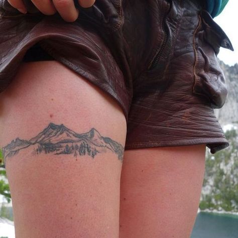 Elevate your style with mountain tattoos. In this article, we will share the best designs from geometric lines to realistic depictions. Floral Upper Leg Tattoo, Coverup Tattoo Wrist, Homey Comb Tattoo Design, Mountains Back Tattoo, Connector Tattoos, Bicep Filler Tattoo, Men Mountain Tattoo, Nature Arm Band Tattoo, Mountain Tattoo Women