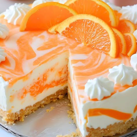 No-Bake Orange Creamsicle Cheesecake Orange Dreamsicle No Bake Cheesecake, Orange Creamsicle Ice Cream Cake, Creamsicle Cheesecake Recipe, Orange Creamsicle Cheesecake Recipe, Orange Creamsicle Cheesecake, Orange Cheesecake Recipes, Icebox Pies, Creamsicle Cheesecake, Graham Dessert