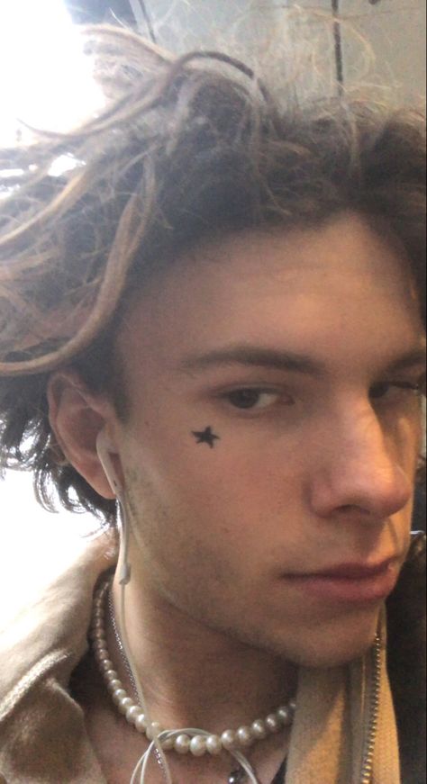 X Face Tattoo, Stars Face Tattoo, Alt Face Tattoo, Y2k Face Tattoo, Star Tattoo Face, Star Tattoo On Face, Small Cheek Tattoo, Face Star Tattoo, Aesthetic Face Tattoo