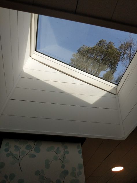 Trim Around Skylight, Skylight Trim Ideas, Shiplap Ceiling With Skylights, Skylight In Stairwell, Skylight Entryway, Cottage Skylight, Shower With Skylight Above, Skylights Ideas Ceilings, Hallway Skylight