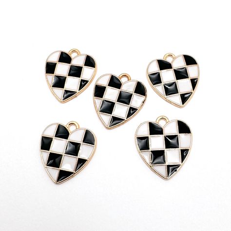 We have our checkered charms in black as well! More colours to be added soon. These are quickly catching up to our bestsellers! #enamel #enamelcharms #enamelpendant #heartcharm #heartpendant #handmadecanada #handmadeusa #handmadejewelry #jewelrymaking #enameljewelry #jewelrymakingsupplies #jewelrysupplies #jewelrydesign #jewelryfindings #diysupplies Turtle Jewelry, Charms For Bracelets, Heart Shaped Pendant, Black Checkered, Insect Jewelry, Love Charms, Heart Shape Pendant, Wine Charms, Enamel Charms