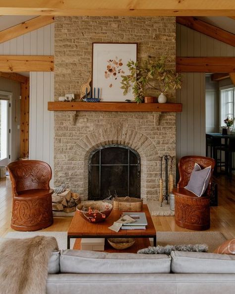 Midwest Living on Instagram: "On a serene parcel of land just outside of Decorah, Iowa, Gail and Larry Larson built a cozy trio of cabins inspired by their Norwegian heritage. The simple interiors feature Nordic treasures and family heirlooms (like the 100-year old cotton runner in the kitchen) mixed with contemporary details. Swipe for a tour ➡️ . . . @jillporterarchitect #interiordesign #scandistyle #homeinspo #homedecor #designinspo #midwestliving #cabin #cabindecor #decorahiowa" Cozy Stone Fireplace, Aesthetic Home Decor Ideas, Fall Mantel Decor, Fall Fireplace Decor, Nordic Architecture, Buying A Condo, Fold Out Beds, Fall Fireplace, Midwest Living