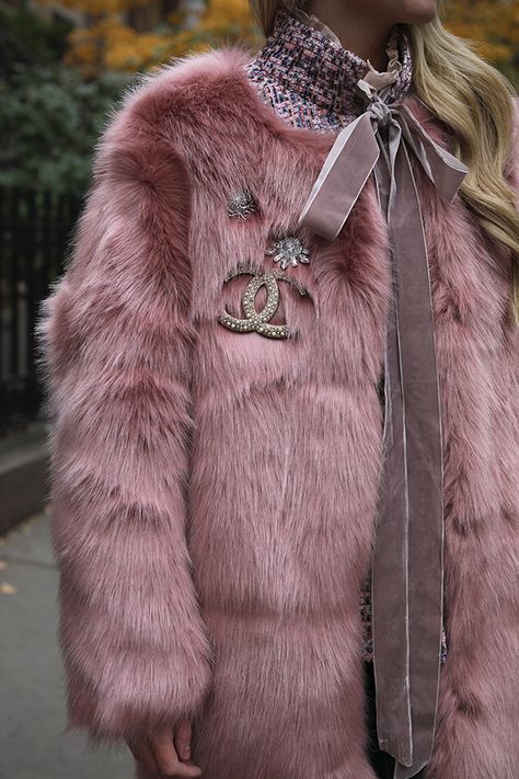 Fall details. Faux Fur, Velvet, and Tweed. Pins for the win! //  Atlantic-Pacific Feminine Winter, Pink Faux Fur Coat, Pink Fur Coat, Outerwear Trends, Chanel Brooch, Catty Noir, Pink Fur, Fur Fashion, Sporty Chic