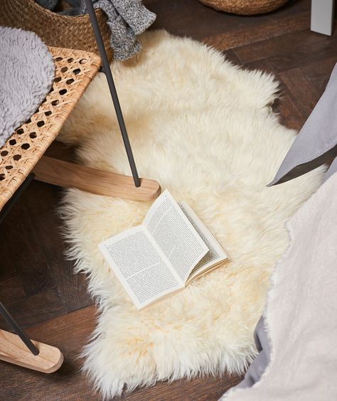 How to clean a sheepskin rug at home without damaging it | Real Homes Uni Bedroom, Brown Leather Ottoman, Sheila E, Wet Spot, Ikea Bedroom, Ikea Family, Cozy Feeling, Sheepskin Rug, Leather Ottoman