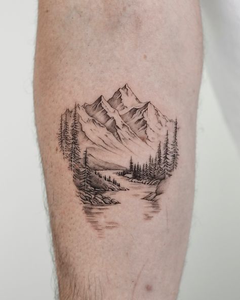 ⛰️ Mountain, River, Forest for Tom. Thank you for your trust and sharing your stories with me. Created at @exp.haus . . . . . #microrealismtattoo #finelinetattoo #londontattoo #londonfinelinetattoo #realistictattoo #tattooidea #londontattoostudio #moutaintattoo #foresttattoo #rivertattoo #mountain Mountain Tattoo Realistic, Mountain Tattoo On Forearm, Mountain And Stream Tattoo, Mountains And River Tattoo, Montana Mountains Tattoo, Forest Line Tattoo, Mountain Tattoo On Shoulder, Outdoor Scene Tattoo, Mountain Patchwork Tattoo