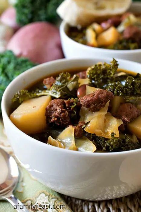 Portuguese Kale Soup - A Family Feast® Beef Goulash Soup, Best Garlic Mashed Potatoes, Portuguese Kale Soup, Baked Manicotti, Kale Soup Recipes, Green Tomato Recipes, Beef Goulash, Garlic Cream Sauce, Kale Soup