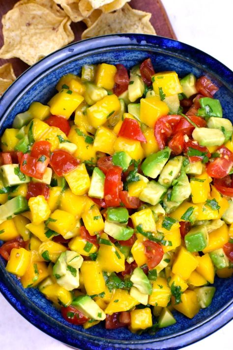 My easy Mango Avocado Salsa has just the right balance of sweet, savory and tang. Try it with a huge bowl of tortilla chips! Mango Avocado Salsa, Mango Avocado, Pineapple Salsa, Avocado Salsa, Chili Lime, Different Fruits, Mango Salsa, Ripe Avocado, Food Test