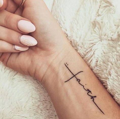 I'm in love with this faith Christian tattoo. What a beautiful, meaningful way to honor our God. Such unique and meaningful tattoo design ideas for women including small cross, verses, symbols on foot, wrist, forearm and more. #wristtattoos #cutetattoos #tattoosforwomen #smalltattoos #tattooideas #minimalisttattoo #christiantattoo #christiantattoosforwomen Faith Tattoos, Tattoos For Women Small Meaningful, Tattoo Thigh, Cross Tattoos For Women, Hair Tattoo, Foot Tattoos For Women, Meaningful Tattoos For Women, Small Meaningful Tattoos, Wrist Tattoos For Women