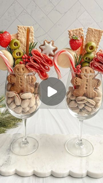 The Board Loon | Kelsey Bassett on Instagram: "Elevate your Christmas soiree with these individual wine glass charcuterie cups🍷✨ these adorable glasses aren’t just for toasting; they’re a chic twist that adds a touch of sophistication to any Christmas gathering. Cheers to festive feasting! 🎄🧀 
.
✨Follow along for more Charcuterie Boards, Midwest Accents, Tutorials, Recipes & more!
.
📬 : TheBoardLoon@gmail.com 
.
. @TheBoardLoon also on TikTok & Facebook
.
 #charcuterie #recipe #theboardloon #cheeseboard #tutorial  #charcuterieboard  #appetizer #cheese #graze #foodie #christmas #christmascharcuterie #individualcharcuterie #charcuteriecups" Christmas Charcuterie Cups, Wine Glass Charcuterie, Individual Charcuterie Cups, Christmas Soiree, Grilled Cheese Bites, Charcuterie Christmas, Individual Appetizers, Charcuterie Cups, Salami And Cheese